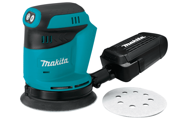 Image displays the Makita DBO180Z, an 18V LXT Random Orbital Sander, showcasing its compact, ergonomic design in Makita's signature teal and black colors. This cordless sander is equipped with a high-performance motor and a 125mm (5-inch) sanding pad, offering efficient and smooth sanding operations. It features three speed settings to match the sanding speed to the material, ensuring optimal finish. The tool is designed for comfort and control, with a rubberized soft grip handle that reduces vibration and fatigue during extended use. An efficient dust collection system minimizes airborne particles, making it ideal for a clean working environment. Perfect for professionals and DIY enthusiasts for various sanding tasks